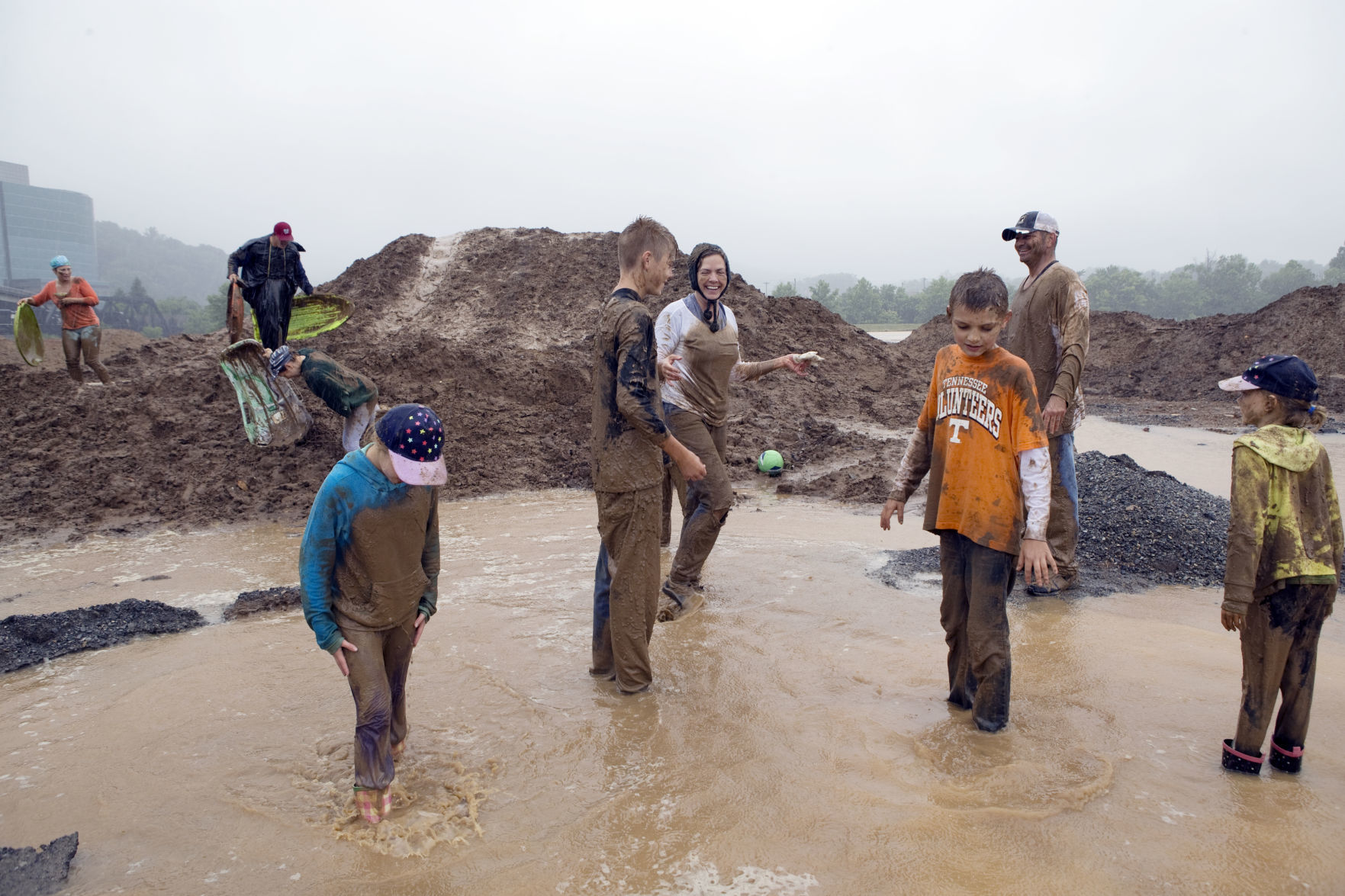 Playing in the mud at a rainy River's Edge